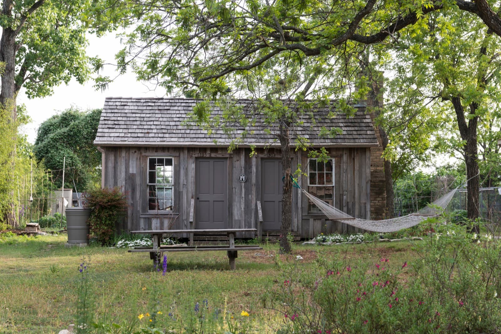 A Clarksville streetscape of restored cottages and mature trees in Old West Austin